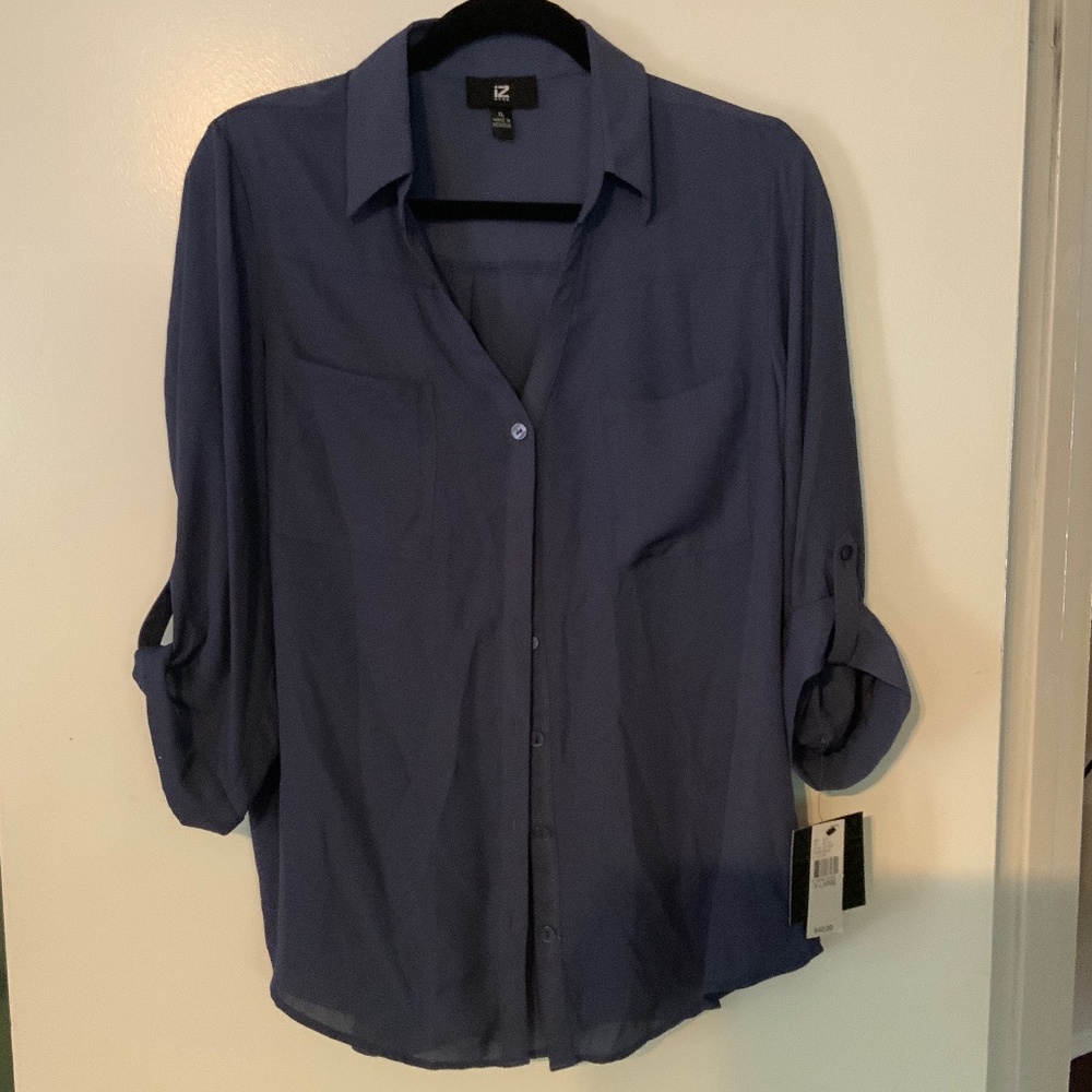 New with tags blue blouse, size XL